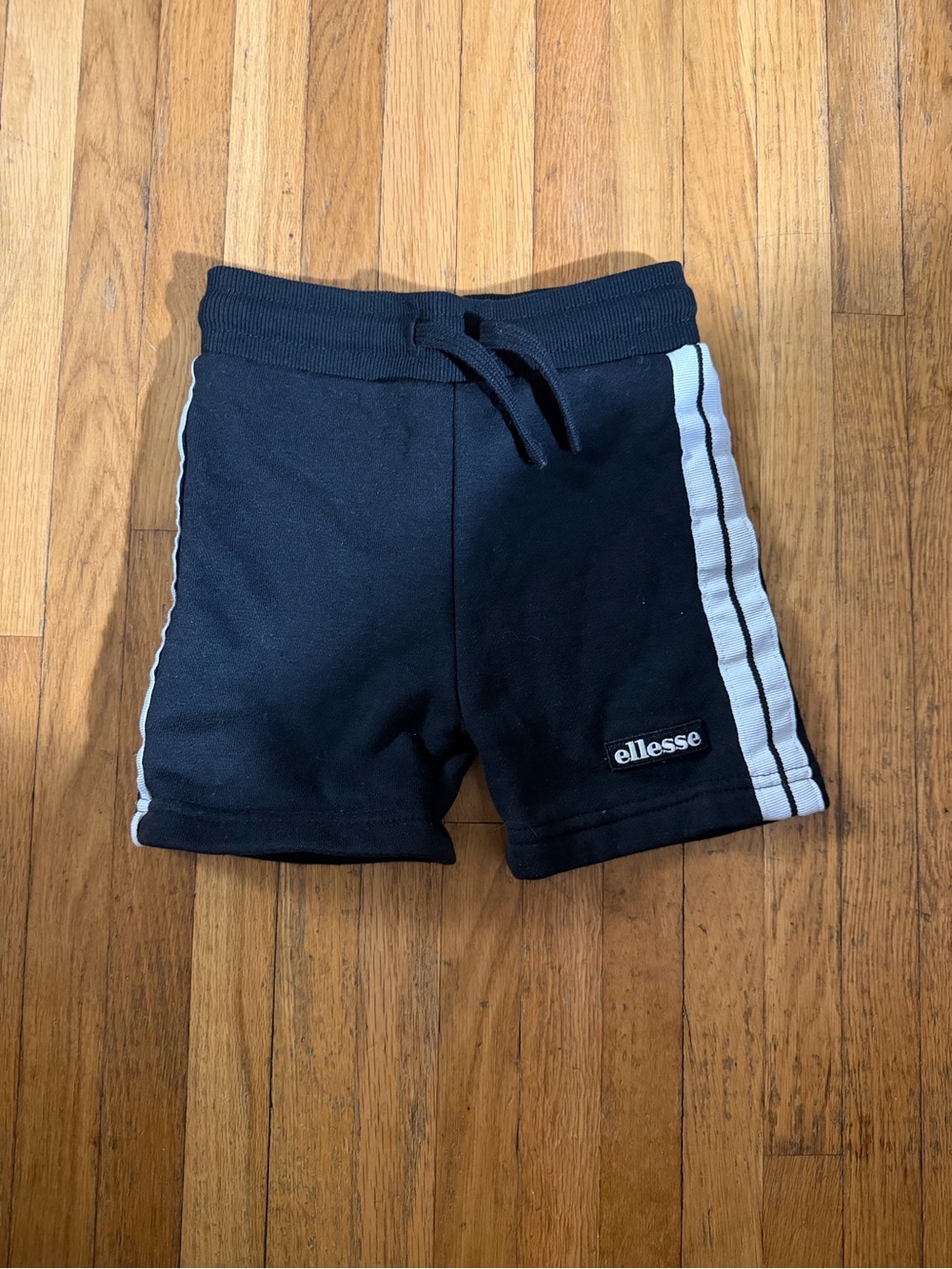 ellesse 2/3 Black Athletic Shorts with White Side Stripes